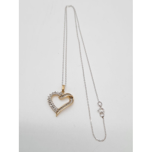 232 - 9ct gold diamond heart pendant on 46cm long 9ct gold chain, weight 2.2g and pendant 17mm long approx