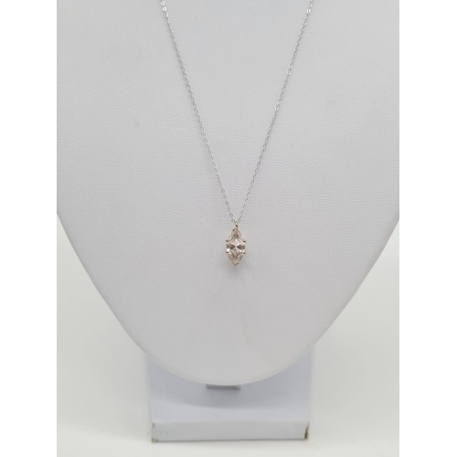 236 - 18ct white gold CZ stone pendant set on a 46cm long 9ct gold chain, weight 1.9g and pendant is 13mm ... 