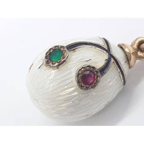 260 - Faberge style egg pendant set in 14ct Russian gold (marked 56), weight 6.97g and 2.5cm drop long