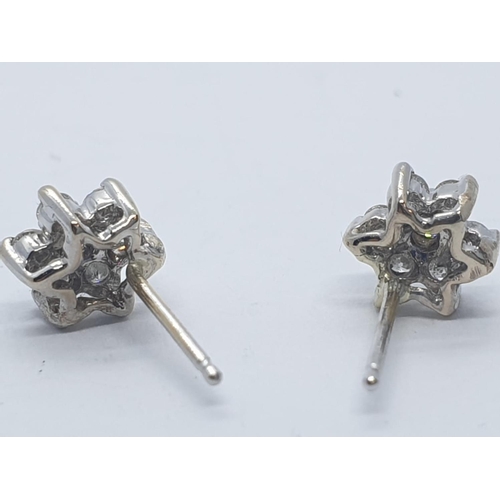 272 - 14ct white gold diamond stud earrings (no back)