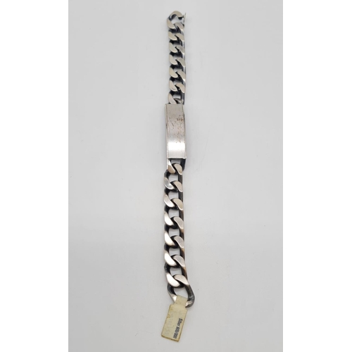 297 - Chunky 800 silver gent ID bracelet, weight 88g and 23cm long approx