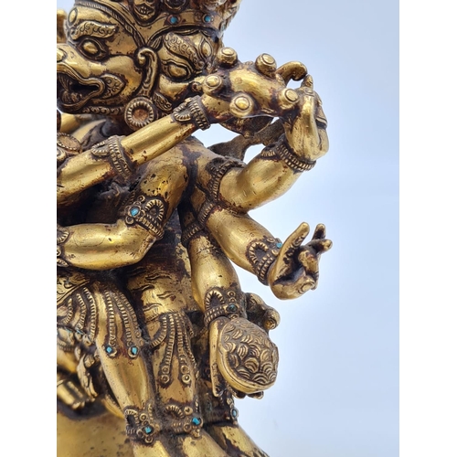 3 - A very early Oriental gilt on bronze statue of a fertility god, weight 2.25kg and 19cm tall approx