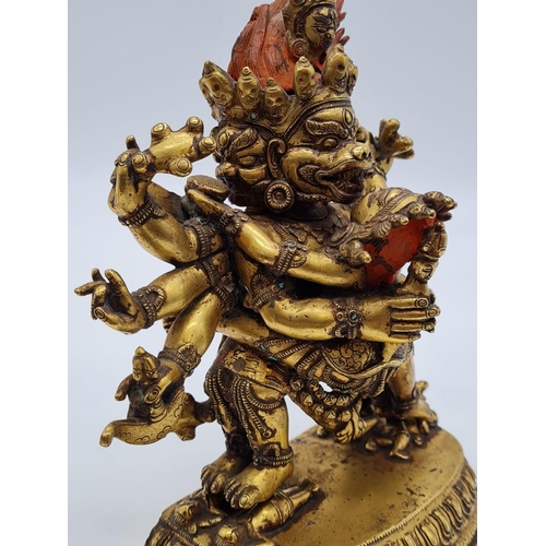 3 - A very early Oriental gilt on bronze statue of a fertility god, weight 2.25kg and 19cm tall approx