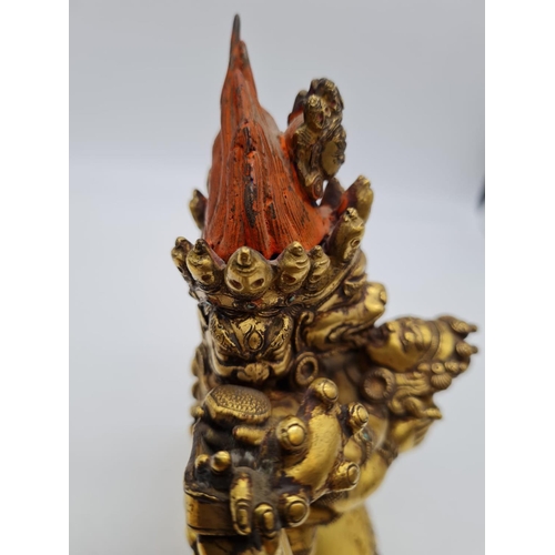 3 - A very early Oriental gilt on bronze statue of a fertility god, weight 2.25kg and 19cm tall approx