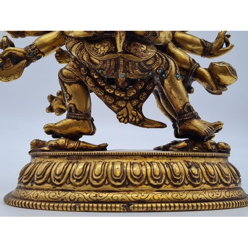 3 - A very early Oriental gilt on bronze statue of a fertility god, weight 2.25kg and 19cm tall approx