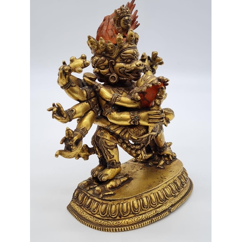 3 - A very early Oriental gilt on bronze statue of a fertility god, weight 2.25kg and 19cm tall approx