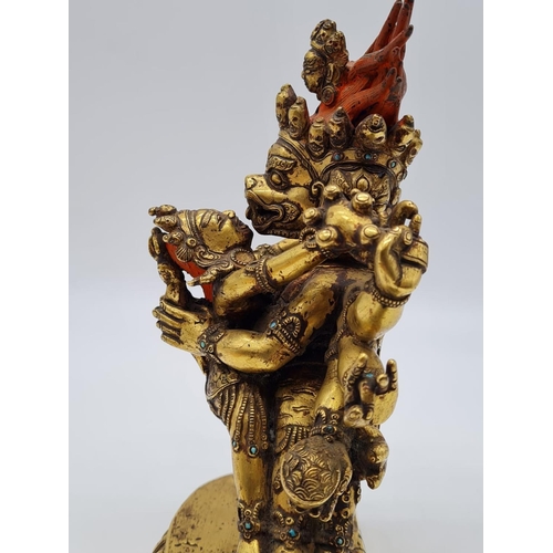 3 - A very early Oriental gilt on bronze statue of a fertility god, weight 2.25kg and 19cm tall approx