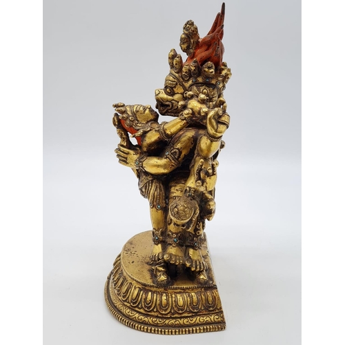 3 - A very early Oriental gilt on bronze statue of a fertility god, weight 2.25kg and 19cm tall approx