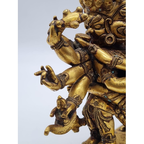 3 - A very early Oriental gilt on bronze statue of a fertility god, weight 2.25kg and 19cm tall approx