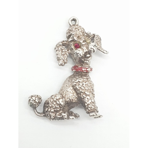 310 - 4x assorted silver pendants/charms of toy poodle, lizard and vehicles, weight 27.19g (4)