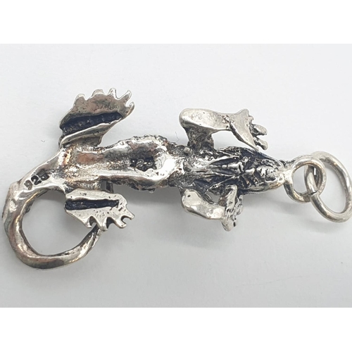 310 - 4x assorted silver pendants/charms of toy poodle, lizard and vehicles, weight 27.19g (4)