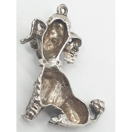 310 - 4x assorted silver pendants/charms of toy poodle, lizard and vehicles, weight 27.19g (4)