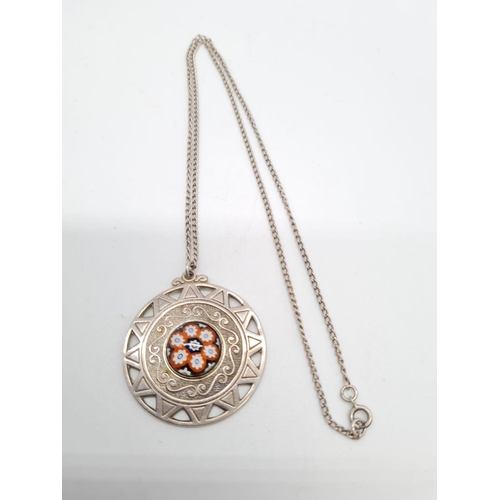 358 - Large silver round pendant with floral enamel designed on a 52cm long silver chain, pendant 4cm diam... 