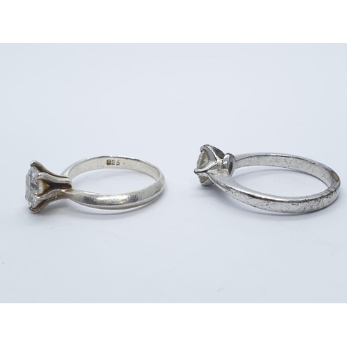 378 - 2x round cut stone set silver rings, weight 5.1g and size  K and M1/2 (2)