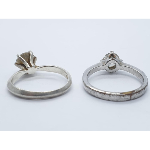 378 - 2x round cut stone set silver rings, weight 5.1g and size  K and M1/2 (2)