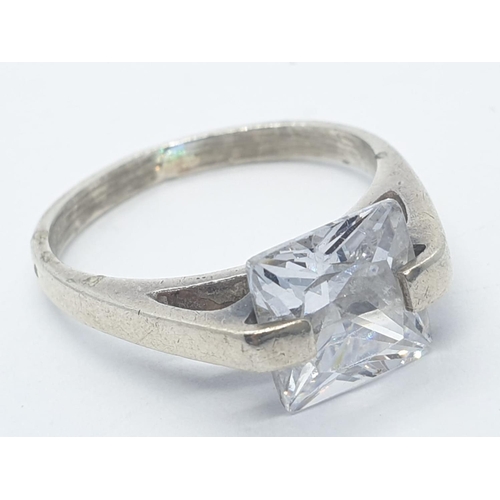 380 - 2x silver rings with squared cut stone solitaire, weight 6.22g and size L and Q