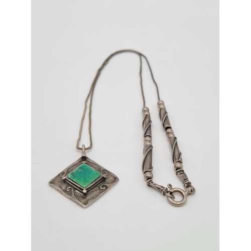 406 - Vintage emerald silver pendant set on 48cm long silver necklace, weight 13.86g and pendant 3cm appro... 