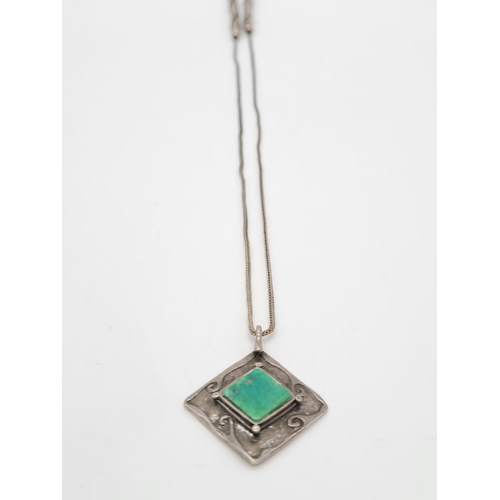 406 - Vintage emerald silver pendant set on 48cm long silver necklace, weight 13.86g and pendant 3cm appro... 