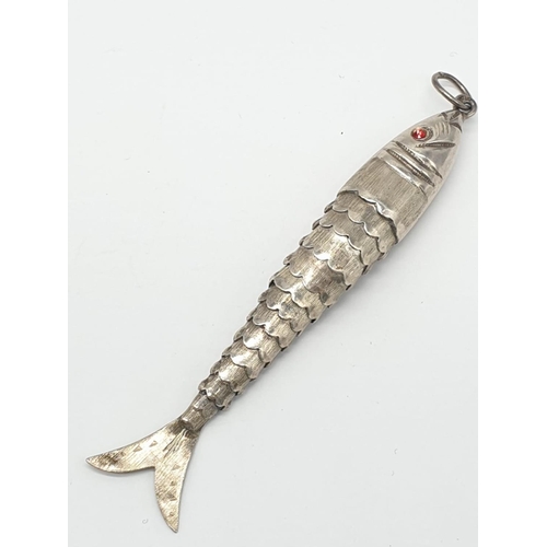 420 - 3x assorted large silver pendant, total weight 24.41g.
Fish pendant 8cm long, treasure trunk opens u... 