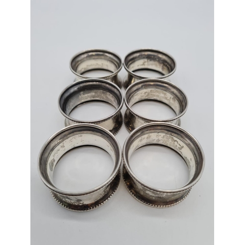 446 - 6 Silver Napkin Rings with a 1924 Birmingham hall mark 57.4g