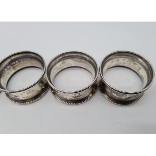 446 - 6 Silver Napkin Rings with a 1924 Birmingham hall mark 57.4g