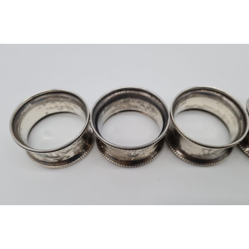 446 - 6 Silver Napkin Rings with a 1924 Birmingham hall mark 57.4g