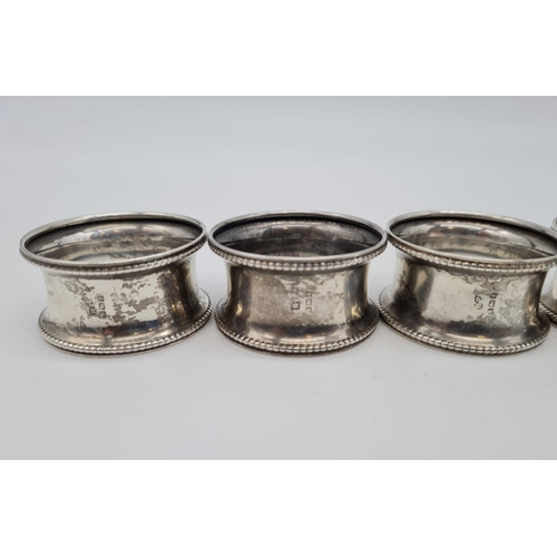 446 - 6 Silver Napkin Rings with a 1924 Birmingham hall mark 57.4g