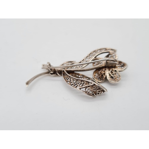 479 - Silver Filigree Brooch in the shape of a flower plus a silver & turquoise Ring