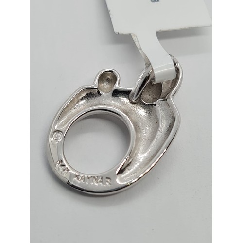 522 - 14CT WHITE GOLD FAMILY PENDANT 2.8g