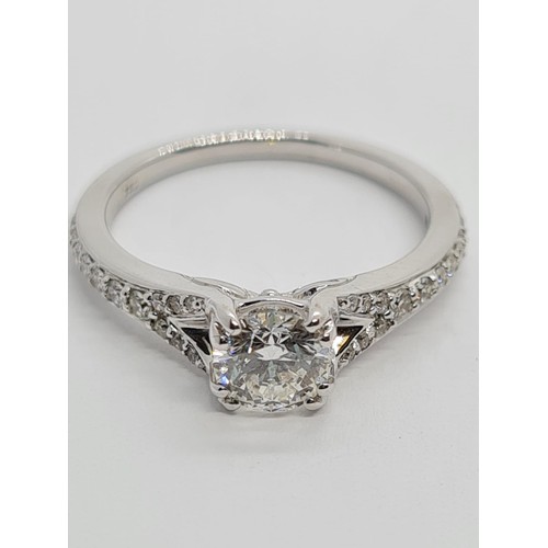 75 - 18CT WHITE GOLD ROUND BRILLIANT DIAMOND SOLITAIRE RING WITH DIAMOND SET SPLIT SHOULDERS, 0.60CT COLO... 