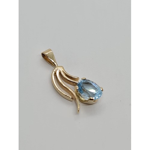 528 - 9CT YELLOW GOLD AQUAMARINE SET PENDANT