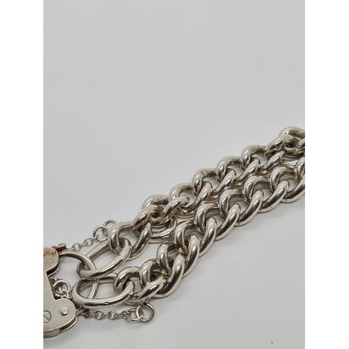 498 - STERLING SILVER CHARM BRACELET WITH NO CHARMS CURRENTLY, WEIGHT 24G AND 20CM LONG APPROX