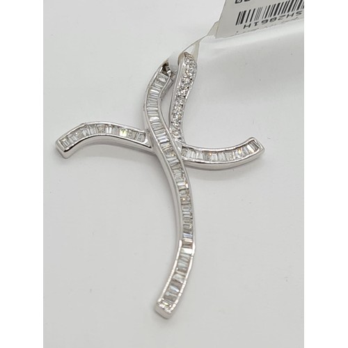 157 - 18CT WHITE GOLD DIAMOND SET CROSS, WEIGHT 2.2g AND 38MM LONG APPROX