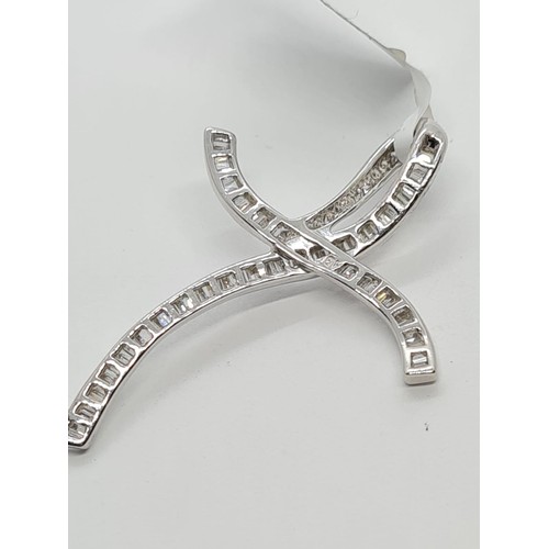 157 - 18CT WHITE GOLD DIAMOND SET CROSS, WEIGHT 2.2g AND 38MM LONG APPROX