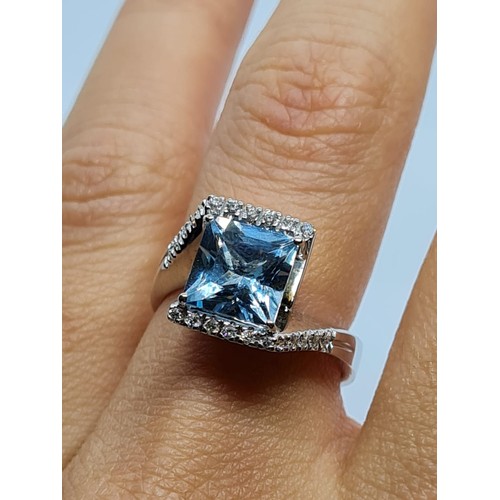 72 - 18ct white gold diamond & Aquamarine ring, weight 8.3g AND SIZE O, stone is 8x8mm approx