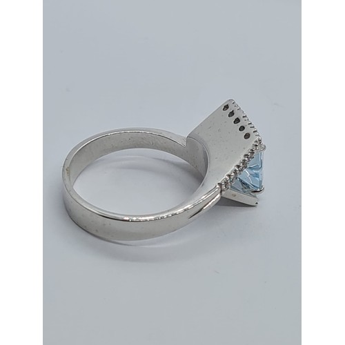 72 - 18ct white gold diamond & Aquamarine ring, weight 8.3g AND SIZE O, stone is 8x8mm approx