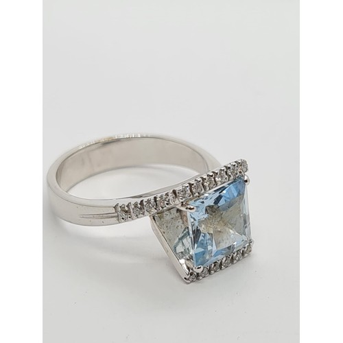 72 - 18ct white gold diamond & Aquamarine ring, weight 8.3g AND SIZE O, stone is 8x8mm approx