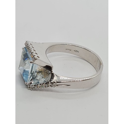 72 - 18ct white gold diamond & Aquamarine ring, weight 8.3g AND SIZE O, stone is 8x8mm approx