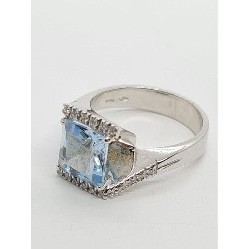 72 - 18ct white gold diamond & Aquamarine ring, weight 8.3g AND SIZE O, stone is 8x8mm approx