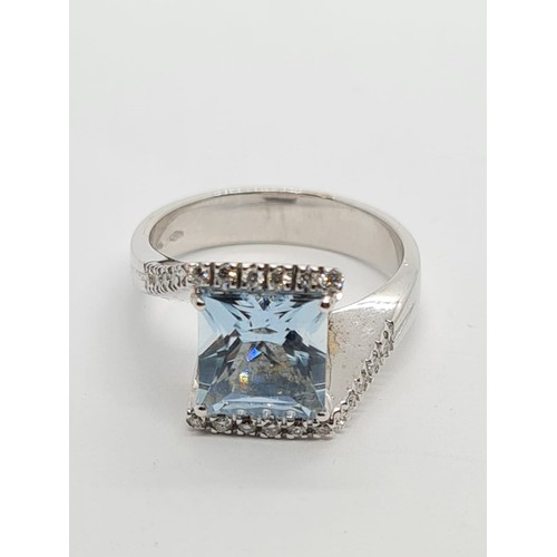 72 - 18ct white gold diamond & Aquamarine ring, weight 8.3g AND SIZE O, stone is 8x8mm approx