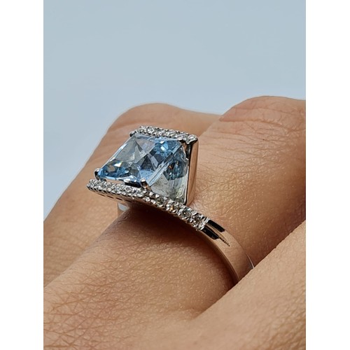 72 - 18ct white gold diamond & Aquamarine ring, weight 8.3g AND SIZE O, stone is 8x8mm approx