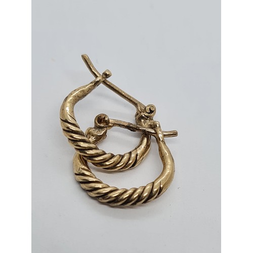 248 - 9ct gold horse shoe earrings