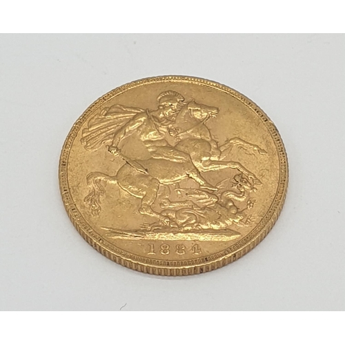 500 - Gold sovereign dated 1884 with young Victoria head in good condition, 8g of 22ct gold