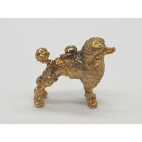 508 - Yellow metal poodle pendant/charm, weight 8.1g approx