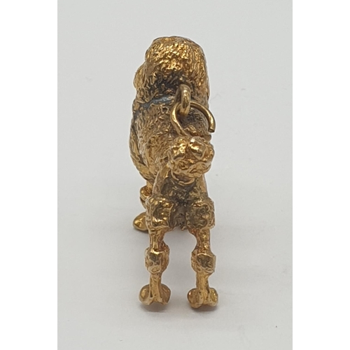 508 - Yellow metal poodle pendant/charm, weight 8.1g approx