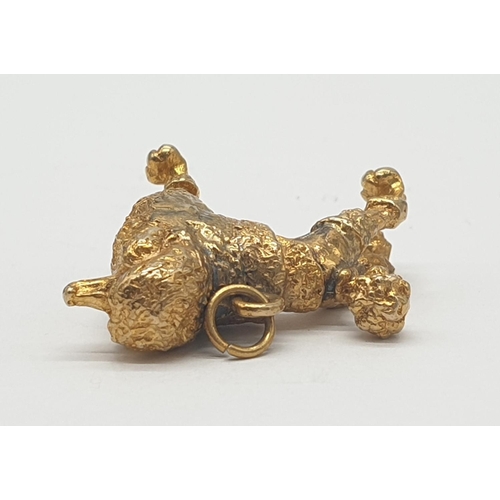 508 - Yellow metal poodle pendant/charm, weight 8.1g approx