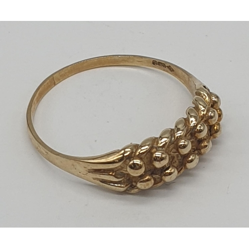 512 - 9ct gold keeper ring, weight 3.5g and size W