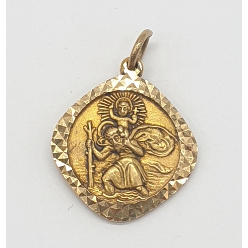 519 - Unusual 9ct gold St Christopher pendant, weight 3.1g