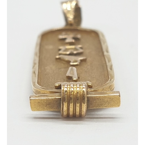 529 - An Egyptian 18ct gold pendant, weight 4.9g