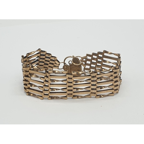 540 - 9ct gold gate bracelet with 7 rows and heart padlock, weight 14.6g and 18cm long approx